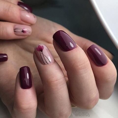 wine colored gel nails with flower design