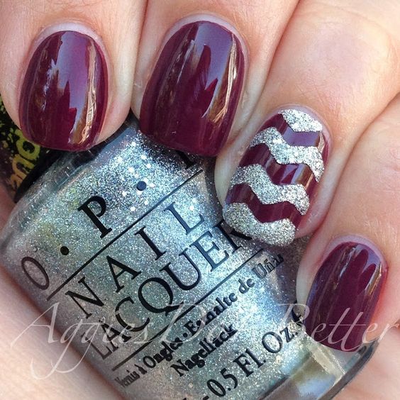 dark red nails with glitter zigzag