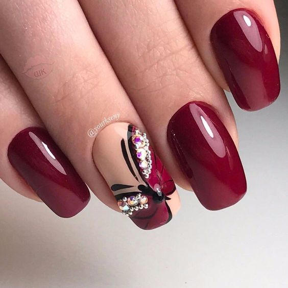 wine burgundy nails with butterfly