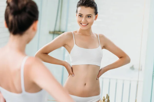 Beautiful Smiling Young Woman Underwear Looking Mirror Bathroom — стоковое фото