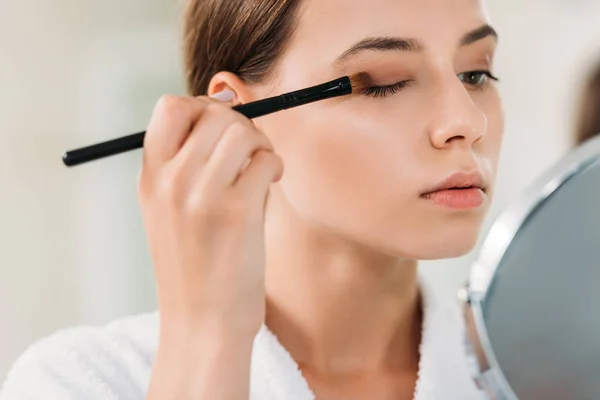 Close View Beautiful Young Woman Applying Eyeshadow Brush — стоковое фото