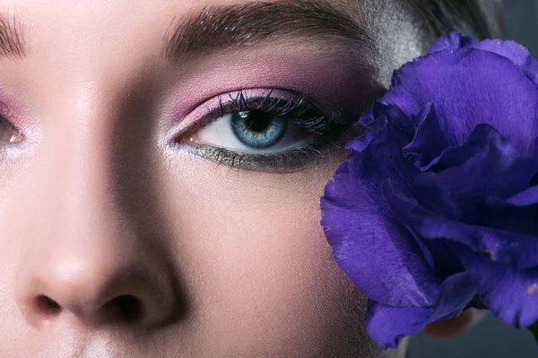 Partial Portrait Beautiful Young Woman Pink Eyeshadows Purple Eustoma Flower — стоковое фото